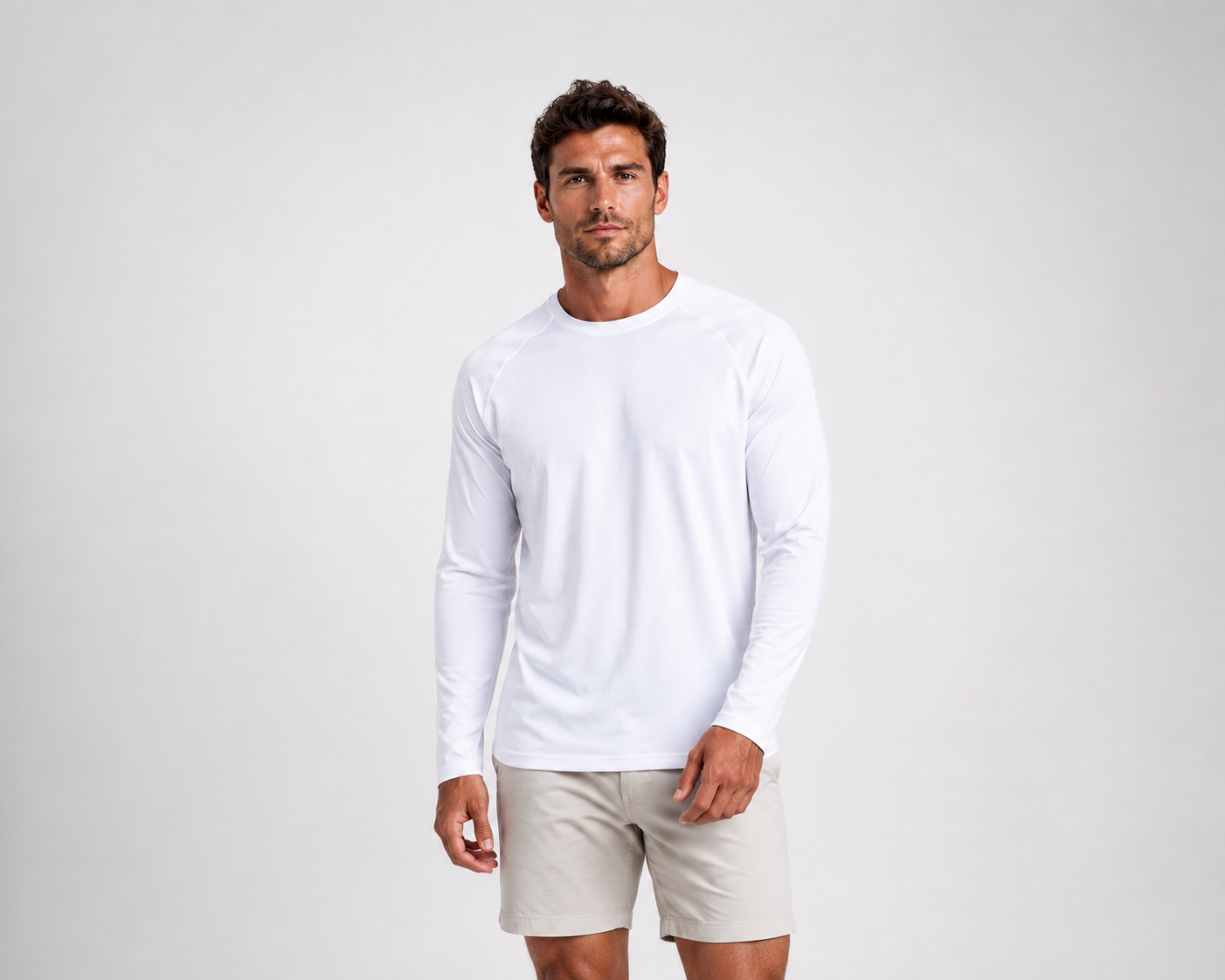 Male model wearing the Hudson Bros. Everyday Shade Long Sleeve performance sun shirt in Bright White against a light studio background.