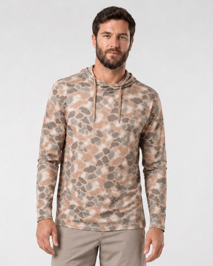 Male model wearing the Hudson Bros. Everyday Shade Oxbow Hoodie in signature tan Camo against a light studio background.