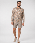 Male model wearing the Hudson Bros. Everyday Shade Oxbow Hoodie, a lightweight UPF 50 performance sun hoodie in signature tan Oxbow Camo.